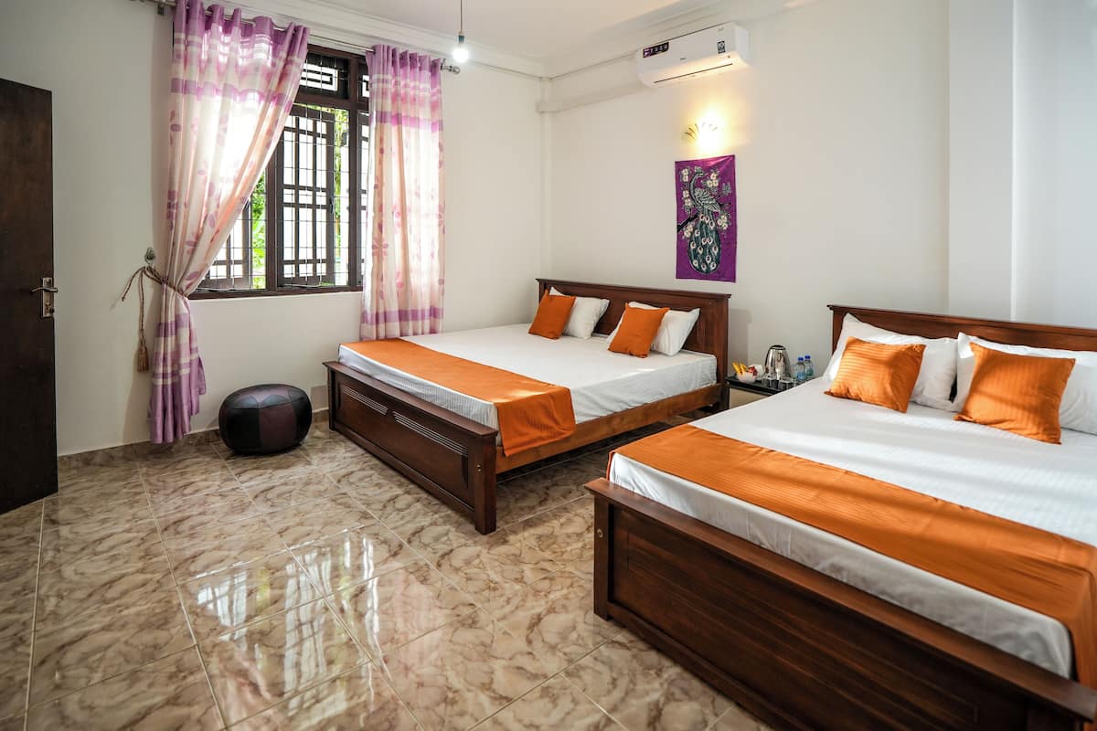 Family Quadruple Room, Garden View | Iron/ironing board