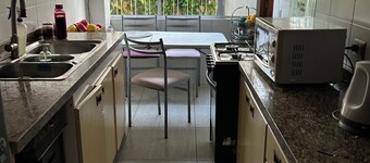 Room with private bathroom. Excellent location steps from the beach.