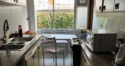 Room with private bathroom. Excellent location steps from the beach.