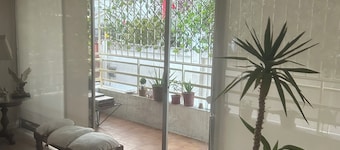 Room with private bathroom. Excellent location steps from the beach.