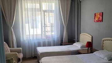 Deluxe Suite, City View | Desk, laptop workspace, free WiFi
