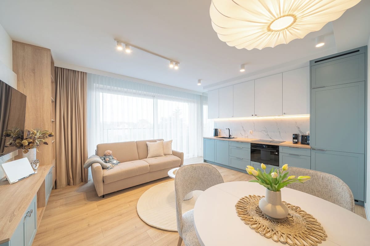 Deluxe Apartment, Air conditioning, Courtyard View | Living area | Flat-screen TV