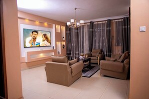 Classic Apartment, Balcony, Garden View | Living area - Karay Apartments (Kampala)