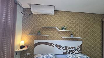 2 dormitorios, tabla de planchar con plancha, Internet y ropa de cama