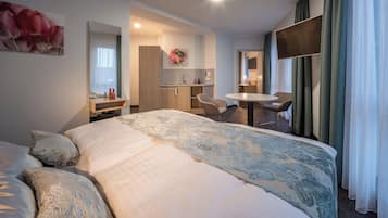 Familienapartment | Wohnbereich | 40-Zoll-Flachbildfernseher mit Kabelempfang, Fußbodenheizung