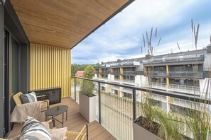 Premium Apartment, Kitchenette, Beachside | Laptop workspace, iron/ironing board, free WiFi