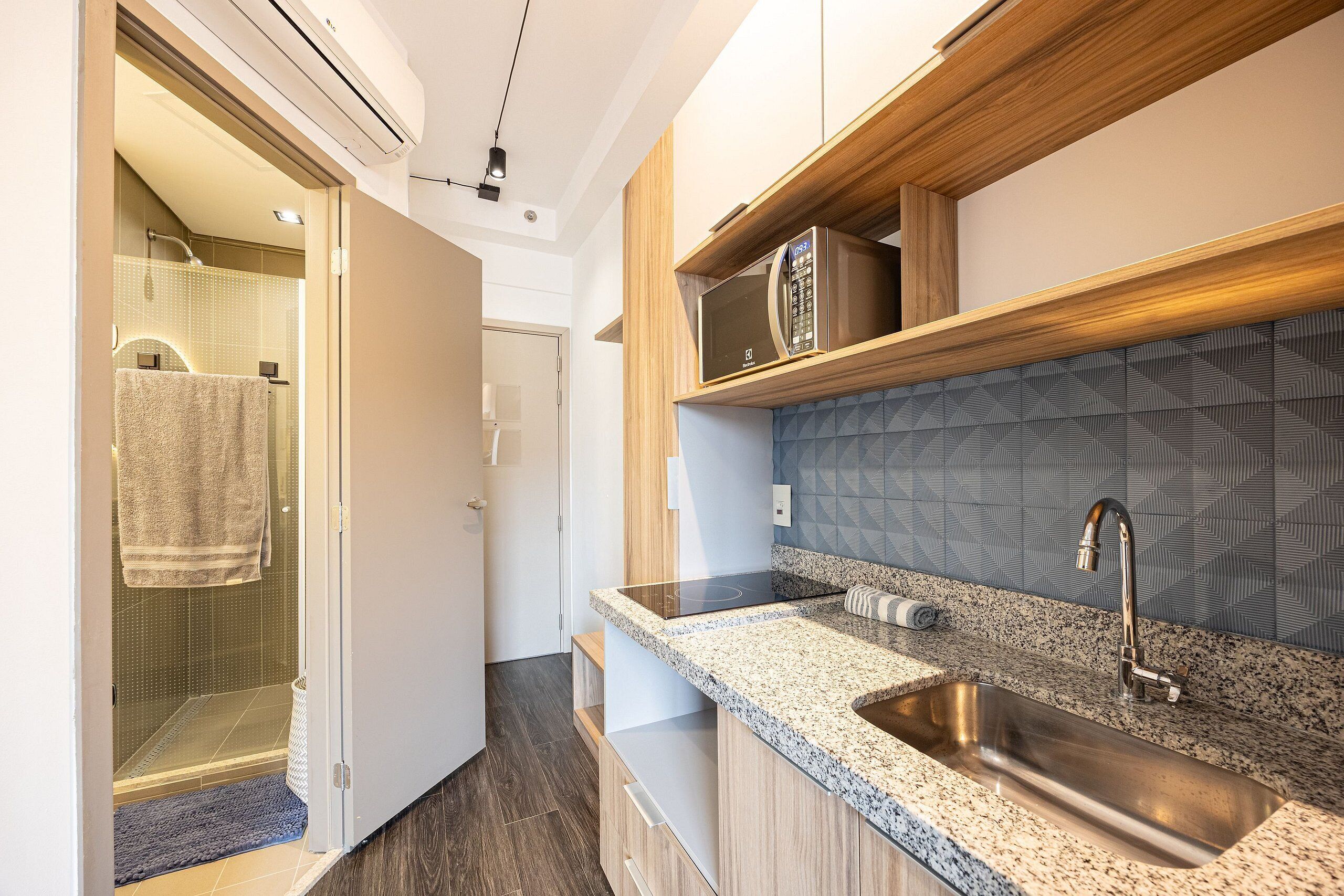 Fridge, microwave, coffee/tea maker, cookware/dishes/utensils