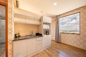 Microwave, coffee/tea maker, cookware/dishes/utensils