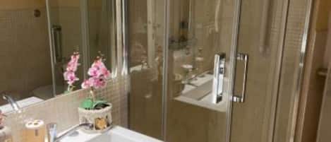 Hair dryer, bidet, towels, soap
