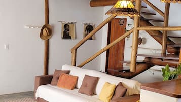 Classic Villa | Living area | 39-inch TV with digital channels