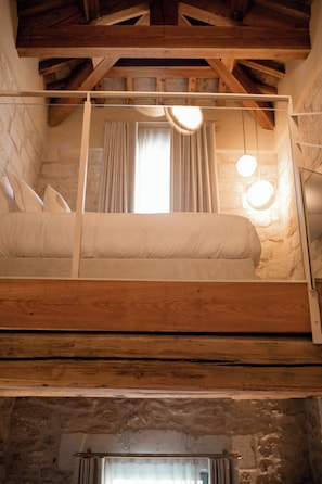 Junior Suite, Balcony, Garden View | In-room safe, blackout drapes, soundproofing, iron/ironing board