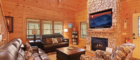 Smart TV, chimenea, videojuegos, mesa de ping pong