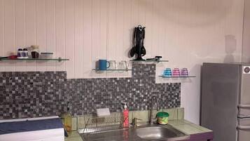 Fridge, stovetop, coffee/tea maker, cookware/dishes/utensils