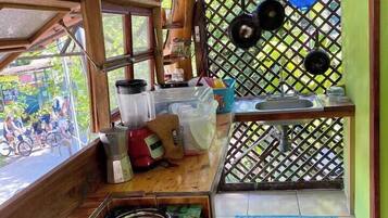Fridge, stovetop, coffee/tea maker, cookware/dishes/utensils