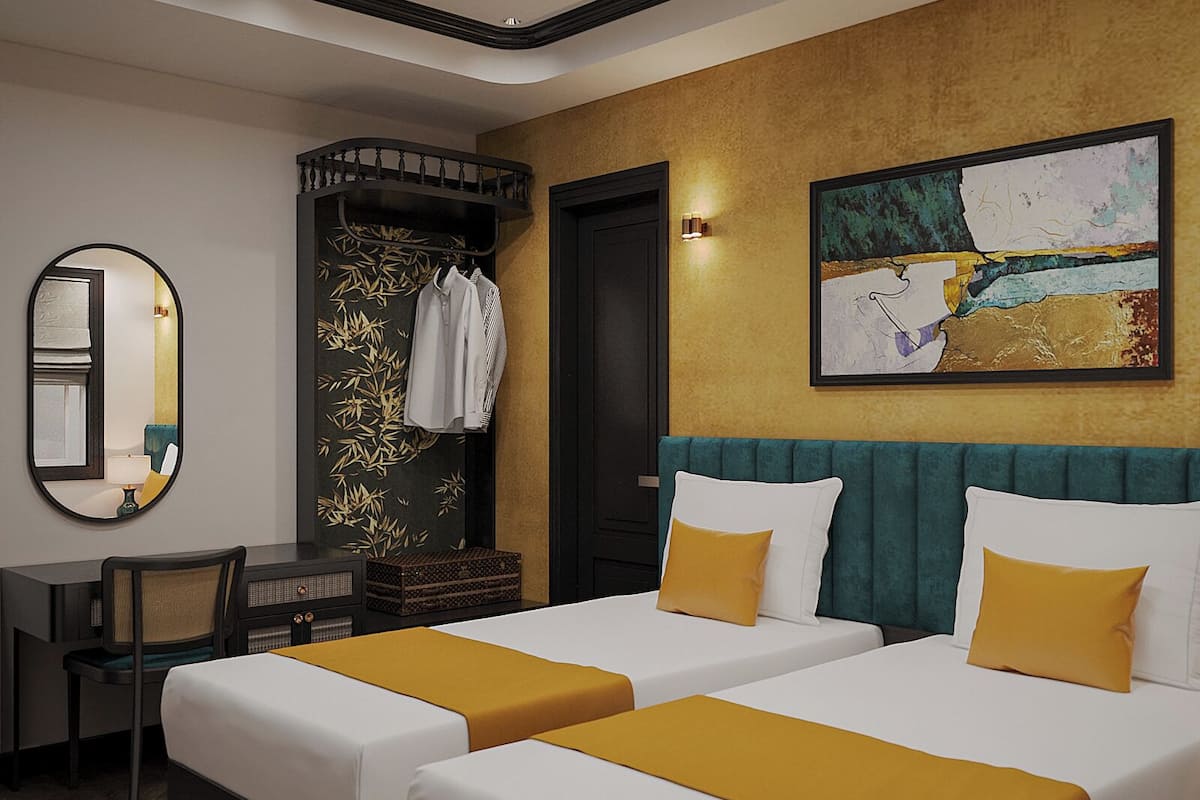 Deluxe Quadruple Room | In-room safe, desk, laptop workspace, blackout curtains