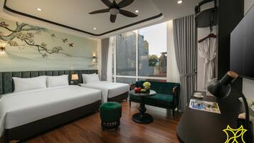 Luxury Triple Room, City View | In-room safe, desk, laptop workspace, blackout curtains