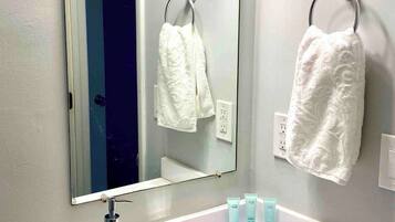 Hair dryer, towels, soap, shampoo