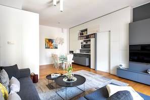 Apartment, 1 Bedroom, Courtyard View | Living area | 30-inch TV with satellite channels