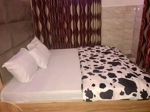 Family Room, Balcony, City View | Desk, laptop workspace, soundproofing, free WiFi