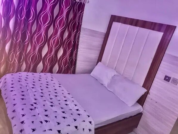 Family Room, Balcony, City View | Desk, laptop workspace, soundproofing, free WiFi