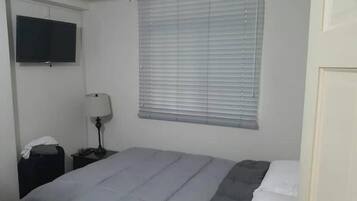 2 habitaciones, tabla de planchar con plancha, wifi y ropa de cama