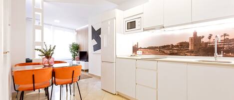 Apartment (1 Bedroom) | Private kitchen | Fridge, microwave, stovetop, dishwasher