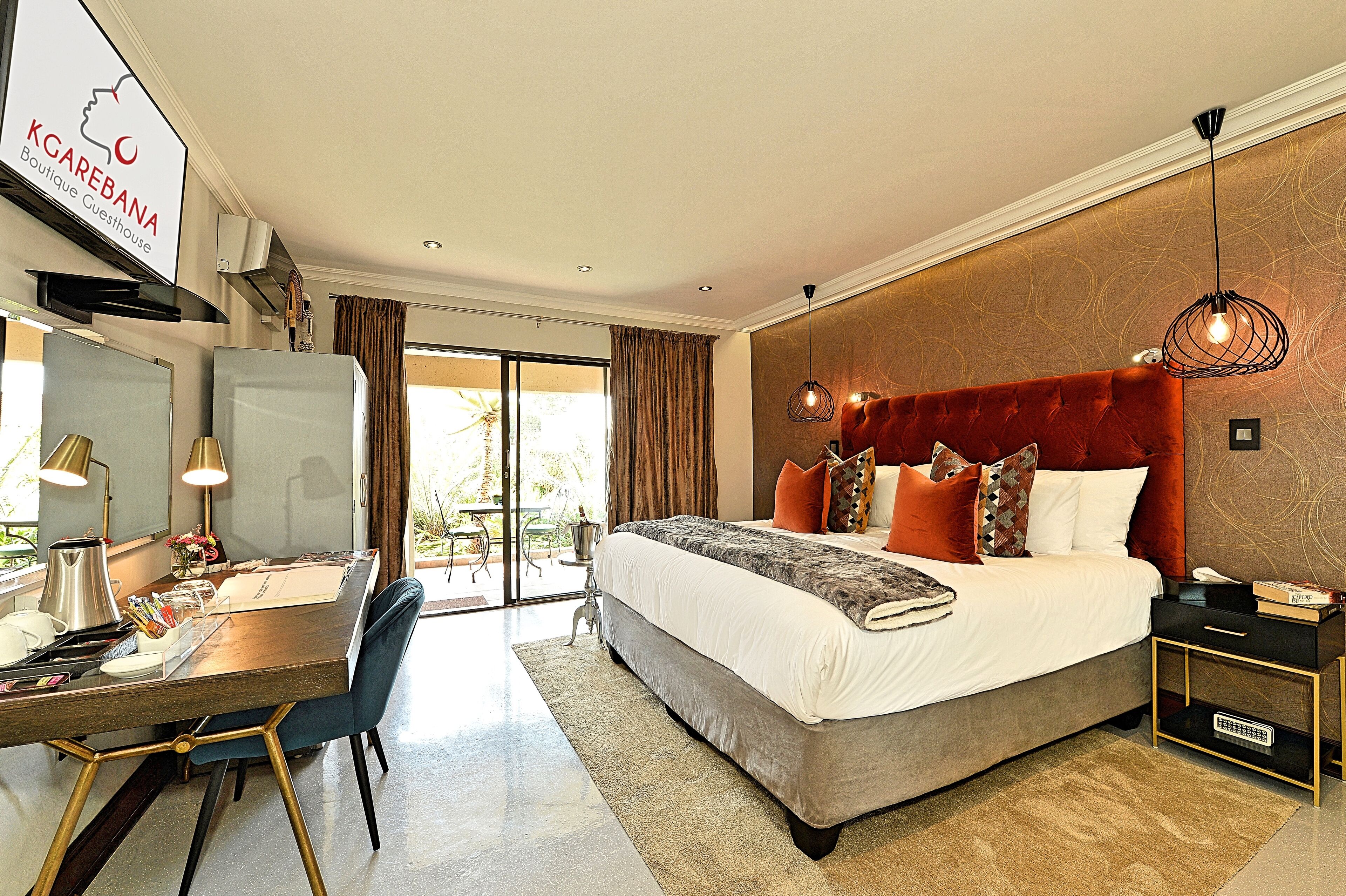 Superior Suite, 1 King Bed, Patio, Garden View | In-room safe, blackout drapes, iron/ironing board, free WiFi