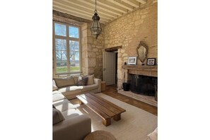 Living area - Luxurious 5-bedroom castle in peaceful Rayet with AC (Rayet)