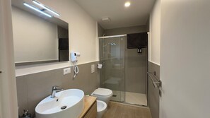 Eco-friendly toiletries, hair dryer, towels, soap