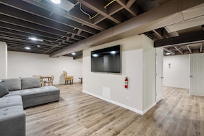 House, Multiple Beds, Hot Tub, Garden View (The Family Nook) | Living area | 50-inch flat-screen TV with digital channels