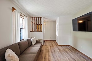 House, Multiple Beds, Hot Tub, Garden View (The Family Nook) | Living area | 50-inch flat-screen TV with digital channels