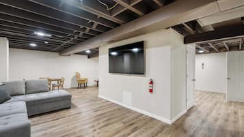 House, Multiple Beds, Hot Tub, Garden View (The Family Nook) | Living area | 50-inch flat-screen TV with digital channels
