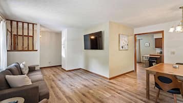 House, Multiple Beds, Hot Tub, Garden View (The Family Nook) | Living area | 50-inch flat-screen TV with digital channels