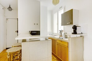 Fridge, microwave, coffee/tea maker, toaster