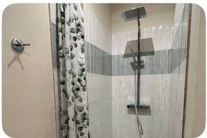 Hair dryer, towels, soap, toilet paper