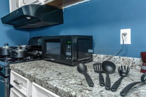 Microwave, stovetop, dishwasher, coffee/tea maker