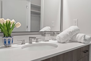 Hair dryer, towels, soap, toilet paper