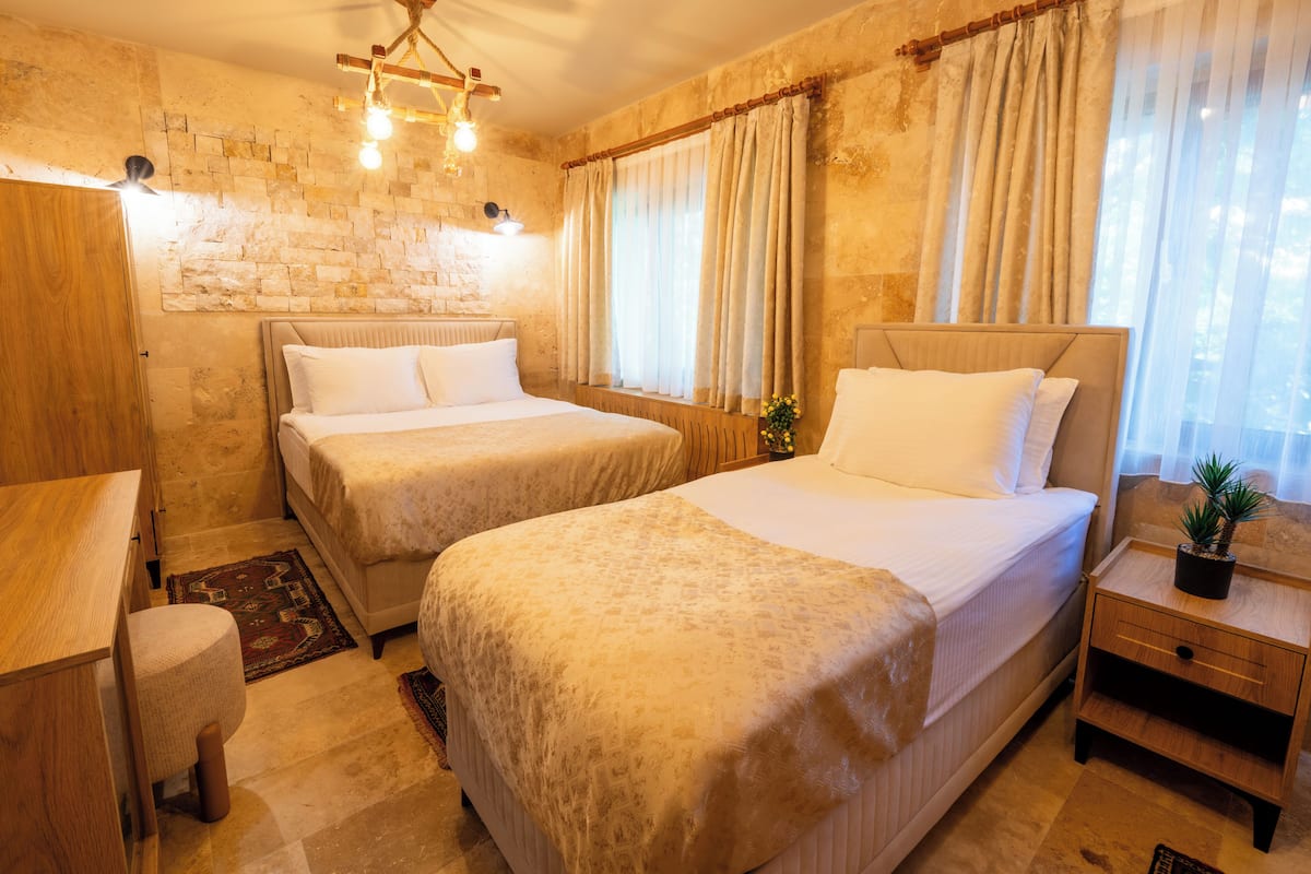 Comfort Triple Room | Minibar, blackout drapes, iron/ironing board, free WiFi