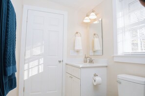 Hair dryer, towels, soap, toilet paper