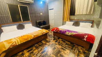 Family Room | Desk, bed sheets