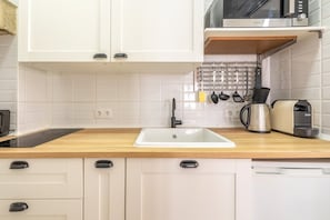 Fridge, microwave, coffee/tea maker, toaster
