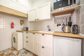 Fridge, microwave, coffee/tea maker, toaster