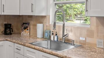 Fridge, microwave, stovetop, coffee/tea maker