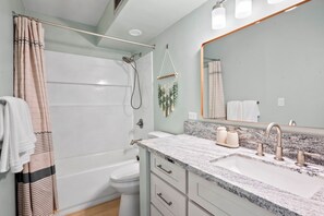 Hair dryer, towels, soap, toilet paper