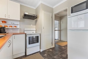 Fridge, microwave, coffee/tea maker, toaster