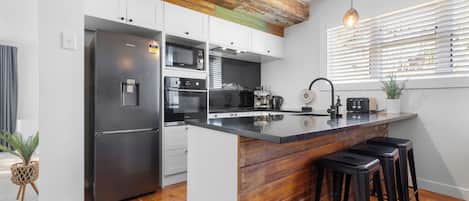 Fridge, microwave, dishwasher, coffee/tea maker