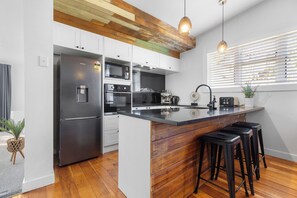 Fridge, microwave, dishwasher, coffee/tea maker