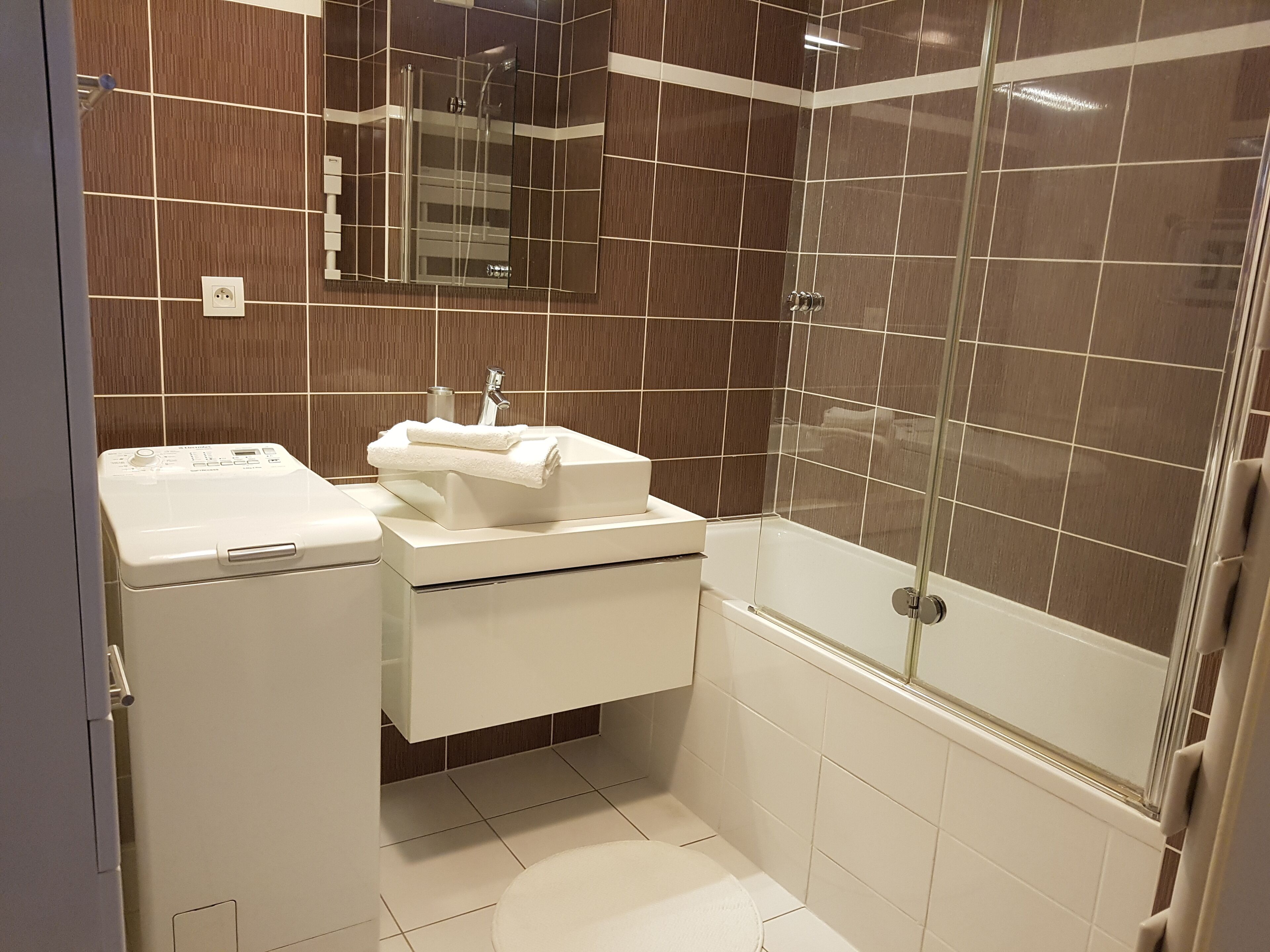 Hair dryer, bidet, towels, soap