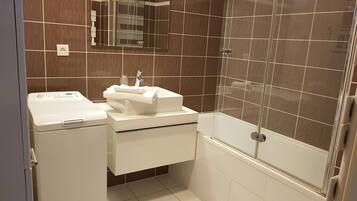 Hair dryer, bidet, towels, soap