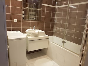 Hair dryer, bidet, towels, soap